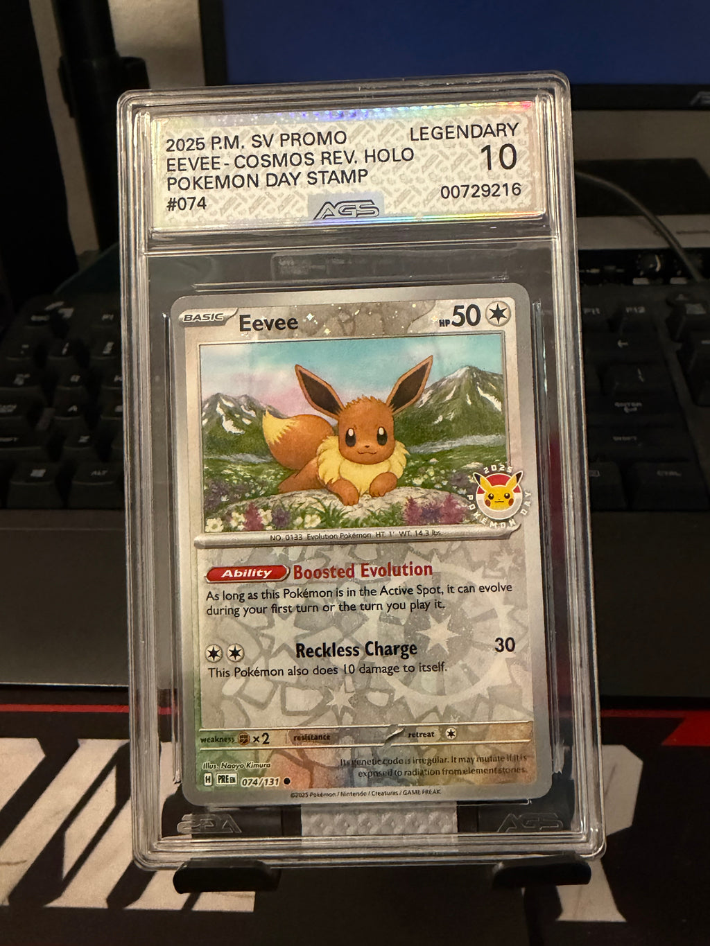 Pokemon 2025 Day Stamp Eevee 074/131 AGS Legendary 10 Reverse Cosmos Holo Promo