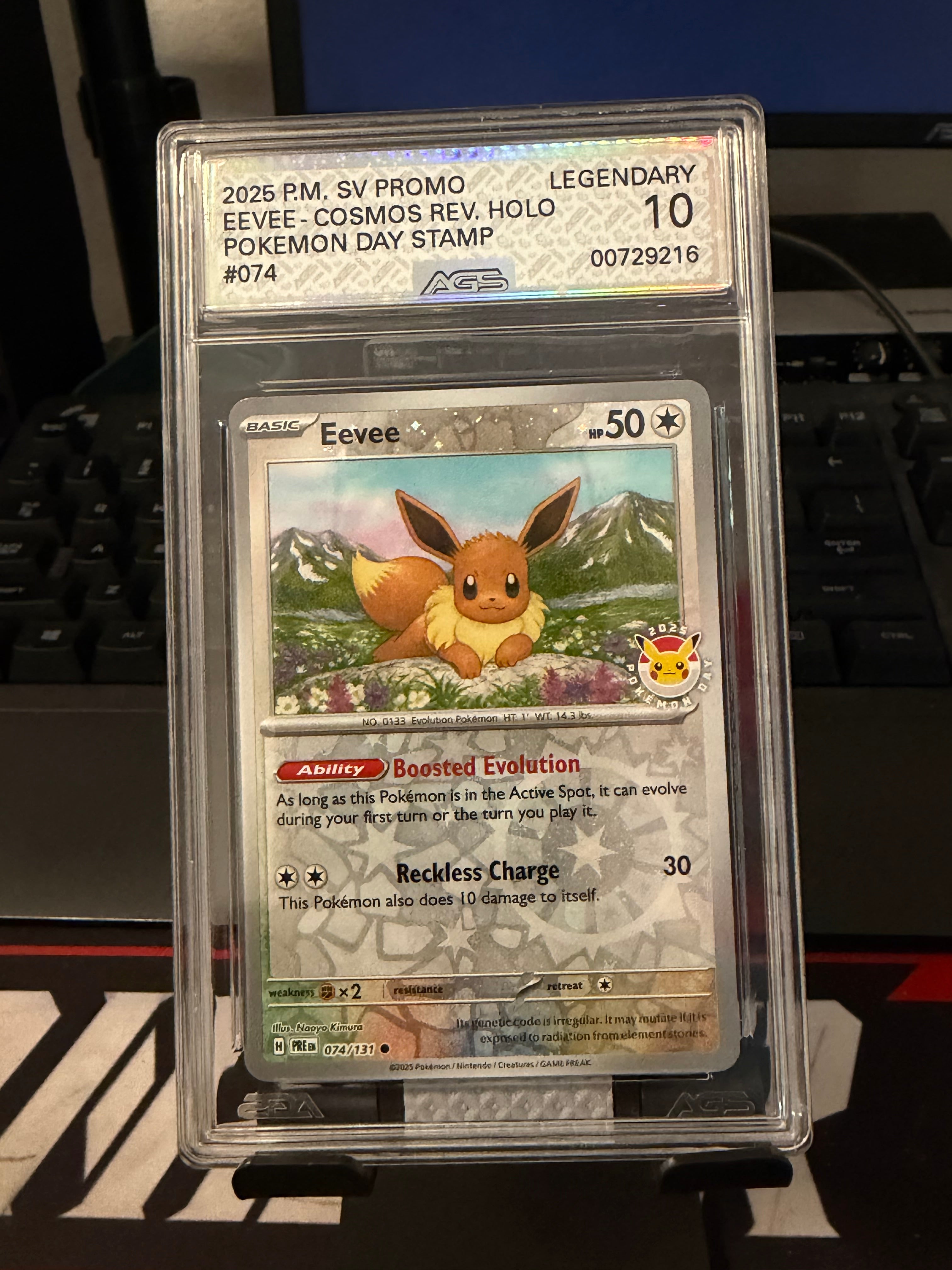 Pokemon 2025 Day Stamp Eevee 074/131 AGS Legendary 10 Reverse Cosmos Holo Promo